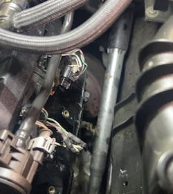 Figure 5: This is fuel shooting out of cylinder #5 as the engine is being turned over by hand.